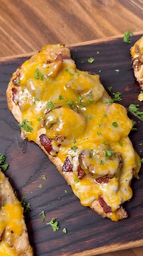 Jordan Hanger on Instagram: "Alice Springs Chicken  Recipe  First marinate your chicken with honey mustard Then season with salt, pepper garlic Fry your bacon til crispy, sauté mushrooms Then grill your chicken breast until 165 degrees Brush on more honey mustard, then add the crispy bacon, mushroom and a pile of cheese Check out the full recipe at theninjacue.com #alicesprings #chicken #grilledchicken #easyrecipes"