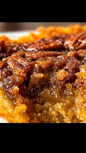 Pecan Pie Dump Cake Ingredients: - 1 cup chopped pecans - 1 cup packed brown sugar - 1 box yellow cake mix (about 15.25 oz) - 1 can (21 oz) cherry pie filling - 1 can (14 oz) sweetened condensed milk - 1/2 cup (1 stick) unsalted butter, melted Directions: 1. Preheat your oven to 350°F (175°C). This ensures that your cake starts baking at just the right temperature for a perfectly golden top. 2. In a 9x13-inch baking dish, evenly spread the cherry pie filling. This will be the lovely base that br
