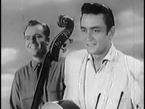 Johnny Cash: Don't Take Your Guns To Town (Lyrics)