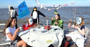 Extinction Rebellion stage 'Tea Party in The Sea' in Cleethorpes