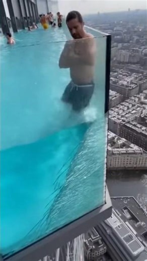 POV: You’re relaxing in a rooftop pool when THIS happens... 🌊🆘