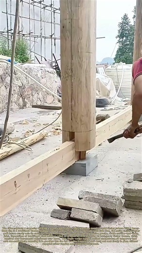 Setting Frames: Carpenter Knocks Out Shim To Settle Full Timber Structure Onto Base