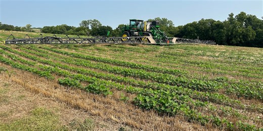 Researchers and leaders in agriculture participate in precision agriculture demonstration