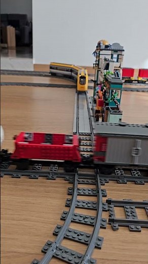 LEGO trains on bridge and crossing – perfect timing! 🚂🌉