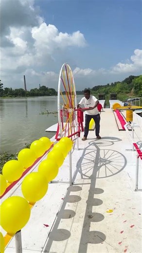 powering a balloon popping machine just by spinning a wheel
