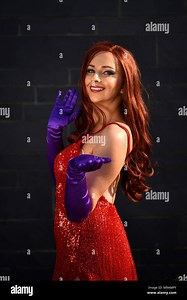 London, UK.  26 May 2018. A woman dressed as Jessica Rabbit joins cosplayers attending day two of MCM Comic Con at Excel in East London.   Thousands of fans of video games, comic books and other popular character take the opportunity to dress up as their favourite characters over the three day festival of pop culture.  Credit: Stephen Chung / Alamy Live News Stock Photo - Alamy