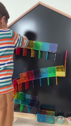 MAGNA-TILES® | Magnetic Tiles on Instagram: "Looking for more vertical play opportunities for your child? Try out this ball run! The first step is to find a large magnetic surface – it could be a magnetic whiteboard or chalkboard, refrigerator, or your garage door. Then, bring your MAGNA-TILES collection and build your own version of this ball run. Vertical play is such a great opportunity for kids to work on hand-eye coordination, spatial awareness, fine-motor and gross motor skills, . Save thi