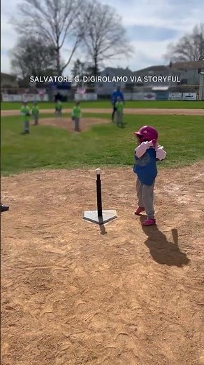Little girl spices up tee-ball hit with stylish cartwheel on way to first base