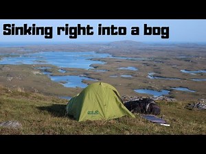 Trying find the route along peat bogs and then sinking right into a bog. The Hebridean Way. Scotland