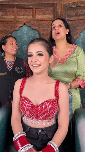 Parul Garg on Instagram: "Studded with Rubies & Diamonds, my stunner in making .. Part 1 MUA : @parulgargmakeup Outfit : @komika_rental_outfit Jewellery : @bridal_jewellery_by_gjint In frame : @niyati_nagpal__ Lipshade : @parulgargbeauty Merlin with Clear Gloss #parulgargmakeup #parulgargbeauty #indianwedding #indianbride #indianmakeupartist"