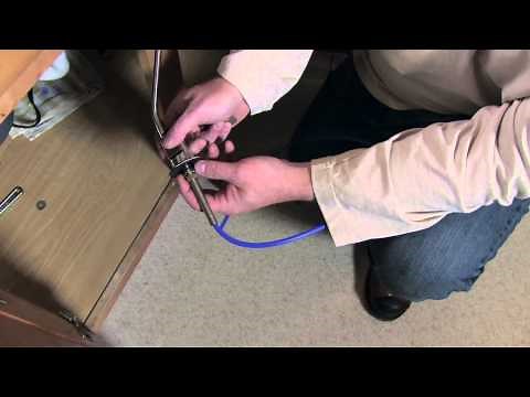 Installing a faucet and water filter