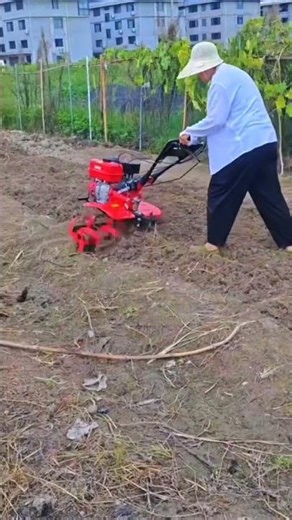 This is the process of plowing land using a mini plow to make it easier for a worker.