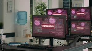 Computers displaying hacking attack alert and security breach in empty it development office. Showing critical error message flashing on screen after system crash, threat warning.