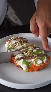 🍞🌶️ The perfect appetizer? Bruschetta with Roasted Red Pepper Cream, Burrata, and Anchovies! Super tasty italian flavours 🧄🧀 Ingredients: 2 red bell peppers 2 heads of garlic Olive oil, to taste Oregano, to taste 1/2 teaspoon paprika 1/4 cup grated Parmigiano Reggiano cheese (30 g) 1/2 teaspoon soy sauce Salt, to taste Thick slices of bread (about 3/4 inch or 2 cm thick, preferably from a loaf) Burrata cheese Anchovy fillets (about 4 per slice) Pine nuts (1 teaspoon per slice) Basil cream (o