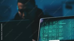 Professional hacker cracking passwords using laptop, stealing personal data