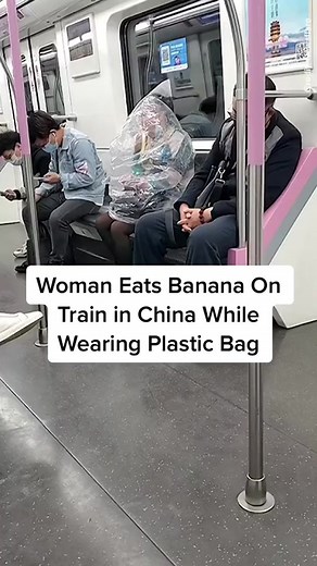Woman Eating Banana on Wuhan Metro with Plastic Bag