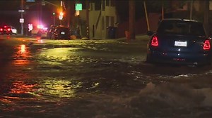 Water main break floods freeway off-ramp in Hollywood