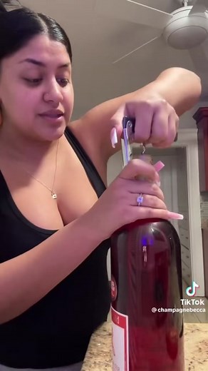 How To Open A Bottle With A Corkscrew