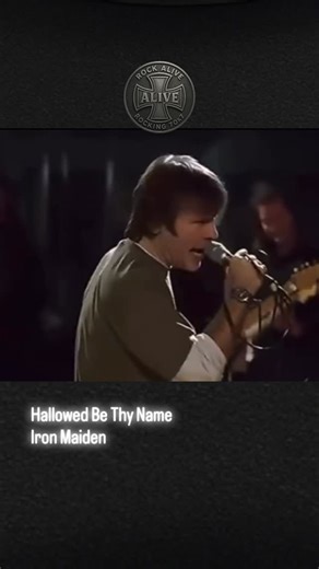Rock ALIVE 70x7 on Instagram: "“Hallowed Be Thy Name” by Iron Maiden was released in 1982 on the landmark album The Number of the Beast. Considered one of the band’s greatest achievements, the song blends dramatic storytelling with shifting tempos, galloping riffs, and Bruce Dickinson’s soaring vocals. Its narrative follows a prisoner reflecting on life in the final moments before execution, a theme that gave the track its unmistakable tension and emotional depth. A notable curiosity: despite ne