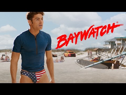 Zach Efron Reveals American Flag Speedo: Super Bowl Baywatch Trailer