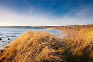 Visit our 'Jewel by the Sea' Pembrokeshire is world renowned for its breath taking seascapes along its 186 miles of coastal path. Ramble through the Stackpole Estate blessed with soft sandy beaches, wooded valleys and the famous lily ponds. Find the romance of St Govan's Head with its tiny chapel tucked into the cliffs. Take a boat to Skomer Island to experience the Atlantic Puffin colony or to the enchanting Caldey, a holy island where Cistercian monks continue the Celtic tradition which began 
