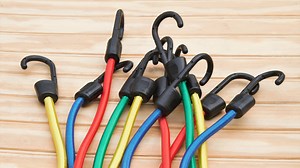 An Old Wire Closet Shelf Will Be Your New Favorite Storage Hack For Bungee Cords