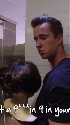 Looking over bathroom stalls with manakin prank