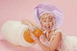 Miley Cyrus dresses up as adult baby in freaky new video