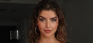 Martial Artist Zoe Gara Drops Jaws In New Cheeky Beach Photos