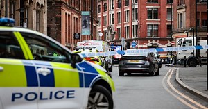 Huge city centre police scene as woman rushed to hospital