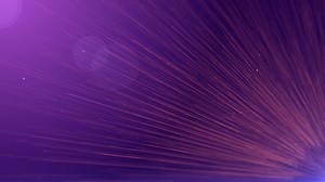 Premium stock video - Exploding light on purple background