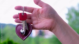 Key Accessories, Fashionable Key Holders in female hand, concept Purchase of residential real estate, Key to Success, Strategic Access Management, Essential Business Tools