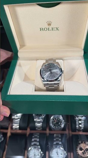 Rolex Oyster Perpetual 39 Rhodium Dial Steel Mens Watch 114300 Review | SwissWatchExpo