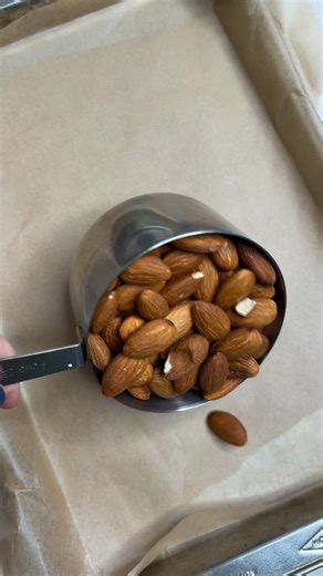 All you need: Almonds Pistachios Vegan chocolate, to melt Method: 1. Place almonds and pistachios on a tray lined with baking paper. 2. Melt the chocolate and add spoonfuls over the top. 3. Place in the fridge for 30 minutes or until the chocolate has set. 4. Enjoy! #dairyfree #dairyfreerecipe #nobake #nobakerecipe | Bella's Vegan Adventures