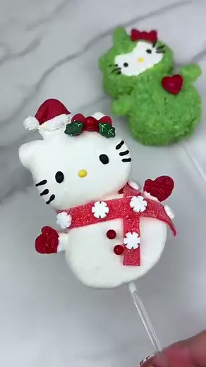 Snowman Hello Kitty marshmallow pop ☃️🎀 Do you want to see how I made Grinch HK too 💚♥️ Dipped in a blend of @Stover & Company sweet shoppe ultra white and eleven o one deluxe melting wafers. I added the | Trisha Harris Review UK