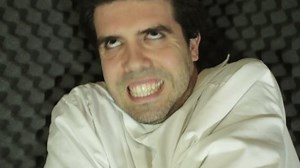 Crazy man in a straight jacket