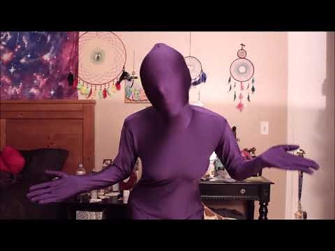 RIDING A GIRAFFE IN A MORPHSUIT