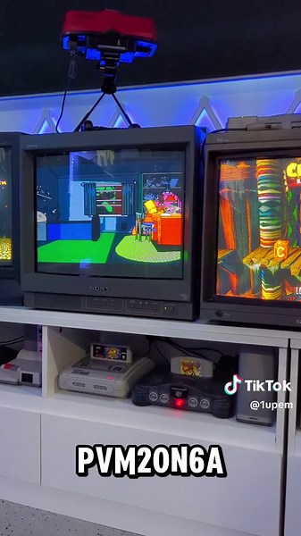 My Retro Game Setup with Consoles and Displays