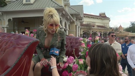 Dolly Parton speaks with News Channel 11 at Dollywood opening