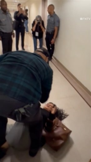 ICE agent shoves woman to ground in courthouse