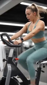 Fit Woman on Stationary Bike – Intense Spin Challenge & Surprised Reaction 🚴‍♀️💥| usa gym