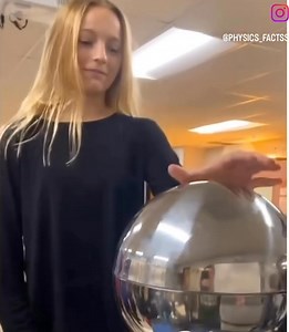 When you place your hands on the charged metal sphere of a Van de Graaff generator, you become part of an elegant and invisible electrical process—one that reveals the fundamental nature of static electricity in a spectacular way. The Van de Graaff generator works by continuously transferring electrons onto its metallic dome, accumulating a high-voltage charge. The moment you touch it, your body becomes an extension of the sphere, absorbing the excess electrons and distributing them evenly acros