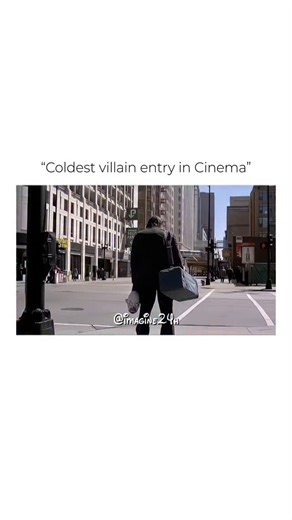 Imagination on Instagram: "Video-114 This iconic opening shot from Christopher Nolan’s The Dark Knight (2008) is widely regarded as one of the most effective character introductions in cinematic history. The video captures the "coldest villain entry" by focusing on the Joker’s back as he stands alone on a busy street corner, holding a clown mask and a duffel bag. Why This Scene Works Composition: By keeping the camera behind him, the film builds immediate tension and mystery, signaling that this