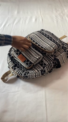 4.3K views · 48 reactions | Carry class wherever you go  The Black ZigZag Backpack is built with 350 GSM Jacquard fabric, padded comfort & heavy-duty durability  Perfect for your daily hustle, travel plans & weekend adventures!  | Handimarts | Facebook