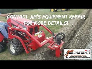 Steiner 450 tractor and Post Hole Attachment