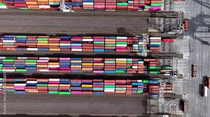 4K Drone shot of modern industrial container port of Rotterdam with containers from top view. It is an import and export cargo port where is a part of shipping dock