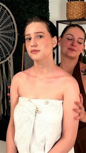 Watch as Mira expertly massages her client's shoulders, releasing tension with each gentle circular