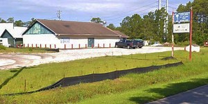 Family of gun store employee killed files suit against owner