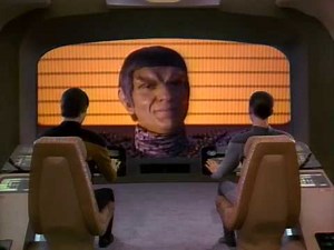 Commander Tomalak and Captain Picard Engage In Dialogue