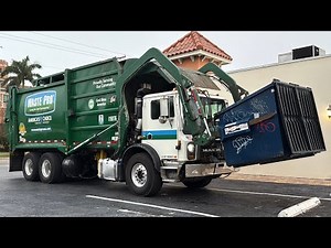 2 EZ Pack Front Loader Garbage Trucks in Florida